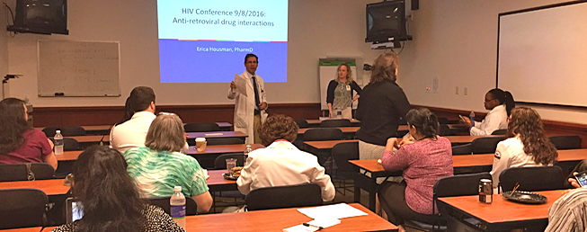 Candid photo of a classroom full of infectious disease fellows