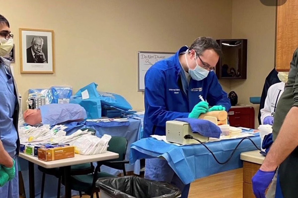 internal medicine resident performing a simulation education