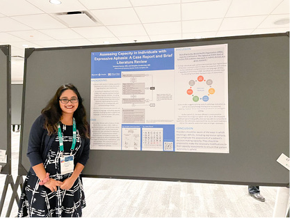 consultation-liaison fellow in front of a presentation