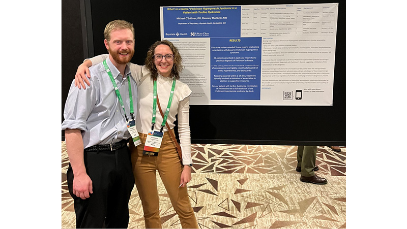 Drs. O’Sullivan and Merideth at their poster on Parkinson-Hyperpyrexia Syndrome