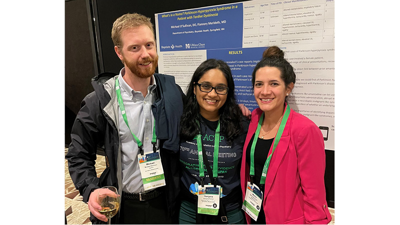 psychiatry residents enjoying the poster session at CLP