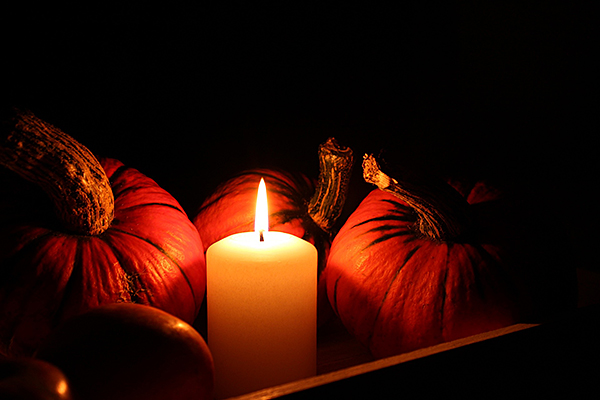 Pumpkins lit by candlelight