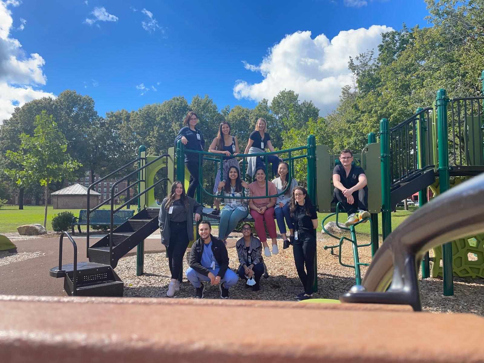 Group photo of Internal Medicine Residents at an outdoor playground 