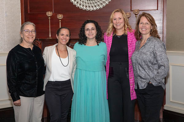 five women at the bwims impact award ceremony