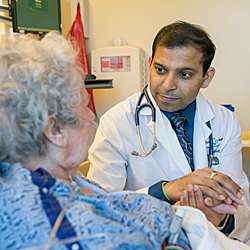Hospitalist Dr. Medarametla with patient