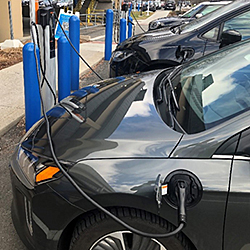 Eelectric car being charged at a charging station