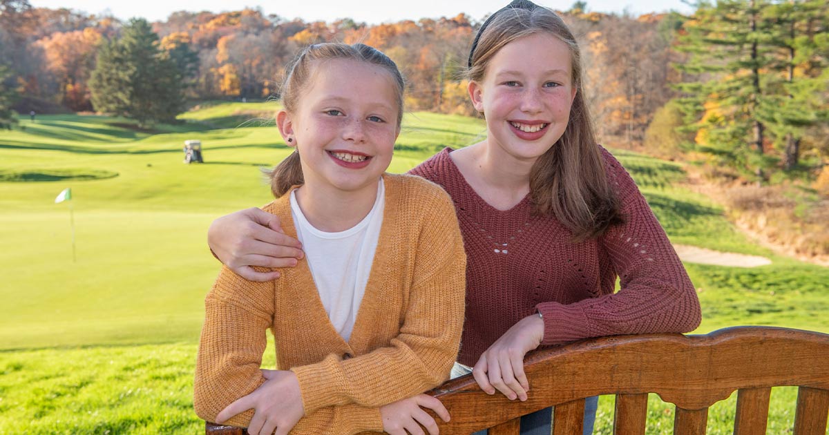 Nora and Ava O'Connor posing at Longmeadow Country Club