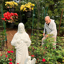 Enzo Di Giacomo tending to his garden