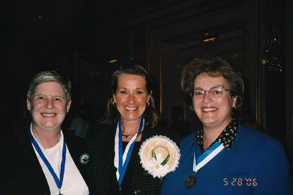 Midwives Barbara Graves, Chris Nuger, and Susan DeJoy gather together for a photo in 2006.