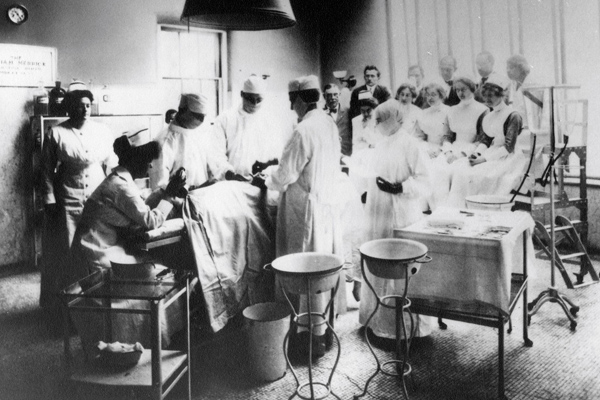 historic black and photo image of a team of surgeons at baystate medical center