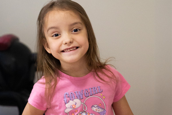 A portrait shot of Elariya smiling