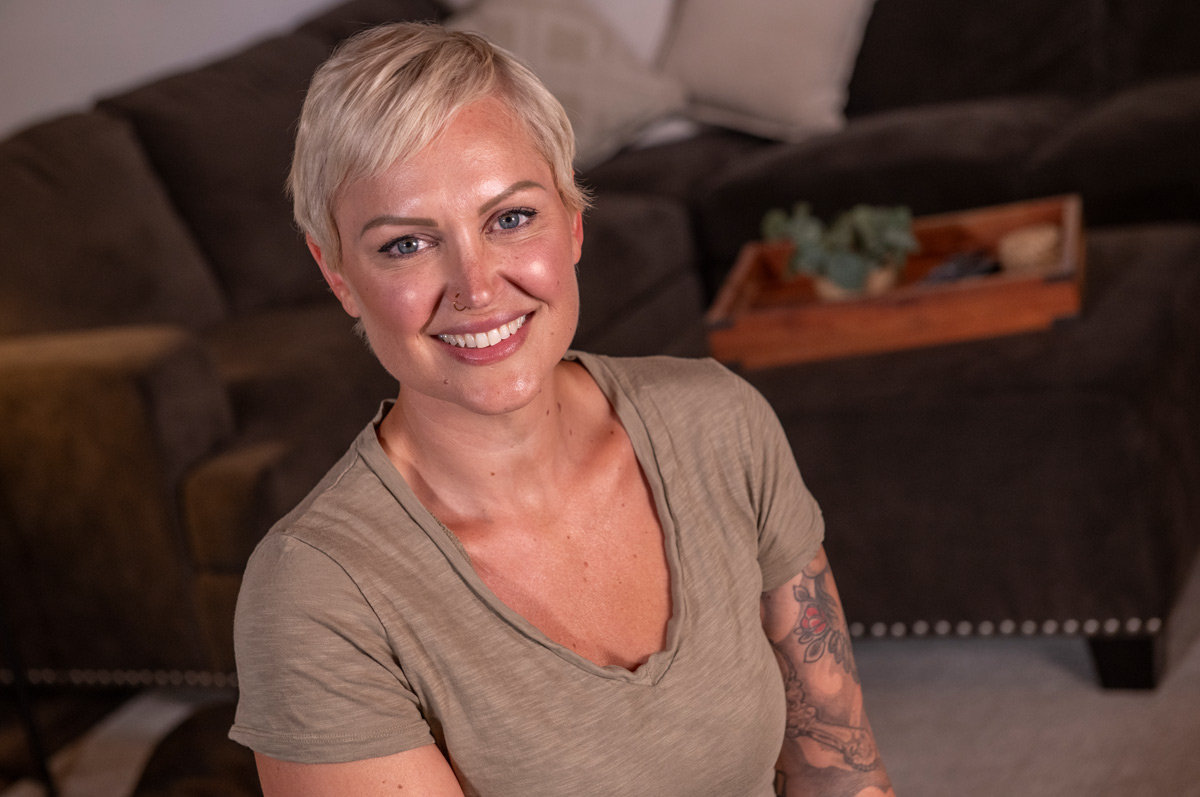 jenn standing in her living room