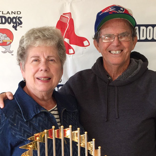 a happy couple posing for the camera