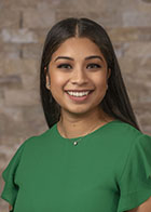 Formal smiling portrait of Dr Virginia Barragan-Lopez