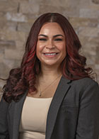 Formal smiling portrait of Dr Stephanie Newsome