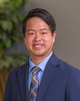 portrait of emergency medicine resident dr. brandon skwarto