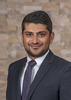 Formal portrait of Dr Navid Alavi