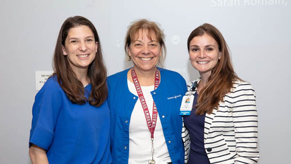 three nurse scientists smiling