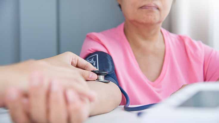 woman stethoscope blood pressure