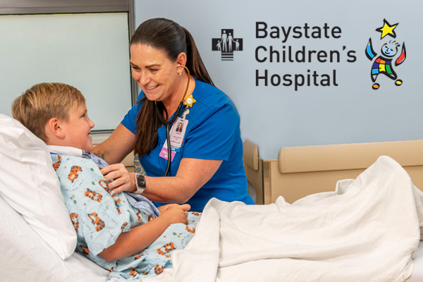 nurse taking care of child in the Baystate Children's Hospital