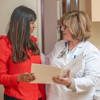 Donna nurse navigator with patient