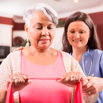 a physical therapist with a patient