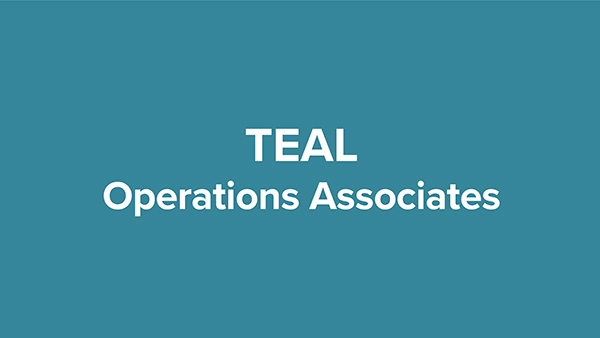 teal colored uniforms representing operations associates
