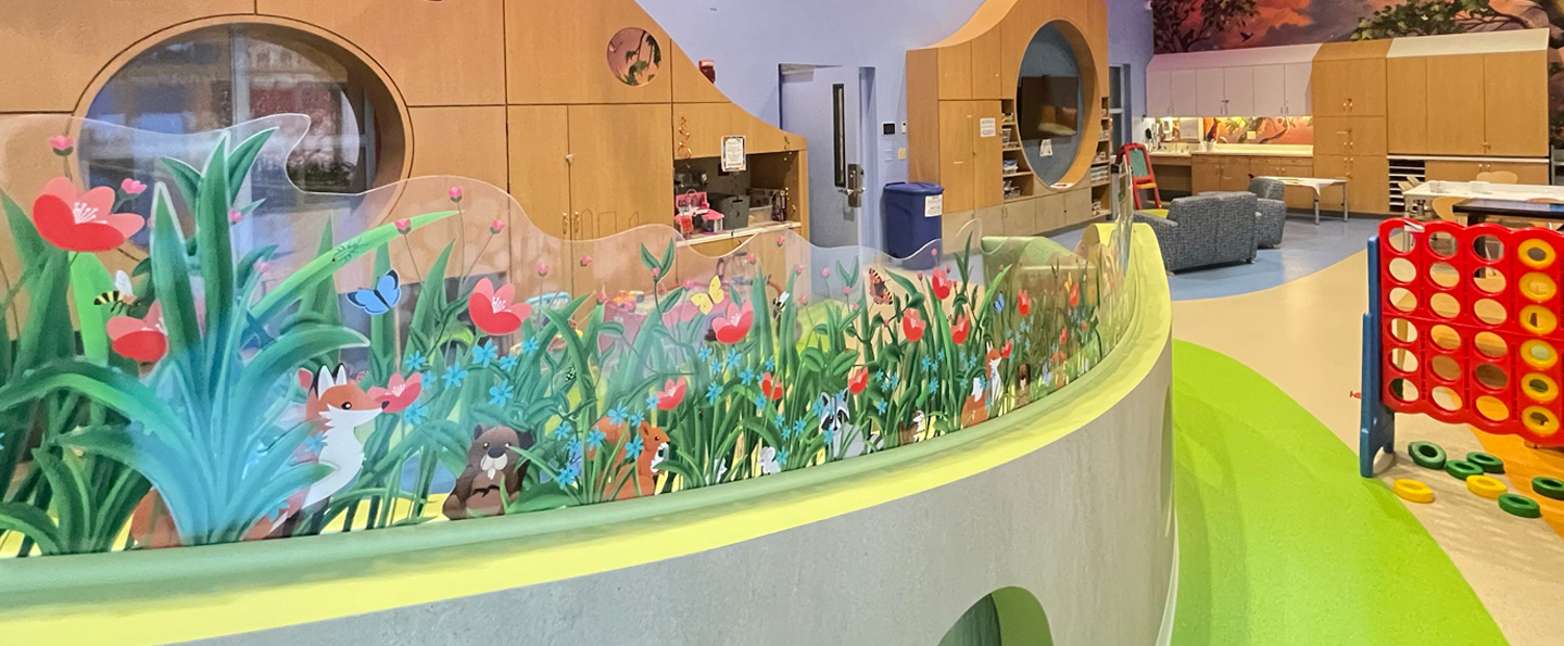 pediatric hospital area with fish decorations and large Four In A Row game