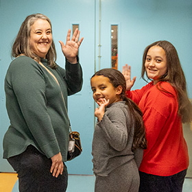 two pediatric patients being discharged with their guardian